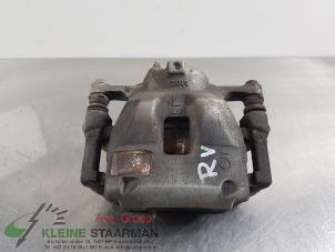 Używane Zacisk hamulcowy prawy przód Toyota Corolla (E21/EA1/EH1) 1.2 16V Turbo Cena € 50,00 Procedura marży oferowane przez Kleine Staarman B.V. Autodemontage