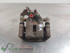 Używane Zacisk hamulcowy prawy tyl Kia Picanto (JA) 1.2 CVVT 16V Cena € 70,00 Procedura marży oferowane przez Kleine Staarman B.V. Autodemontage