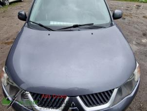 Używane Maska Mitsubishi Outlander (CW) 2.4 16V Mivec 4x4 Cena € 125,00 Procedura marży oferowane przez Kleine Staarman B.V. Autodemontage