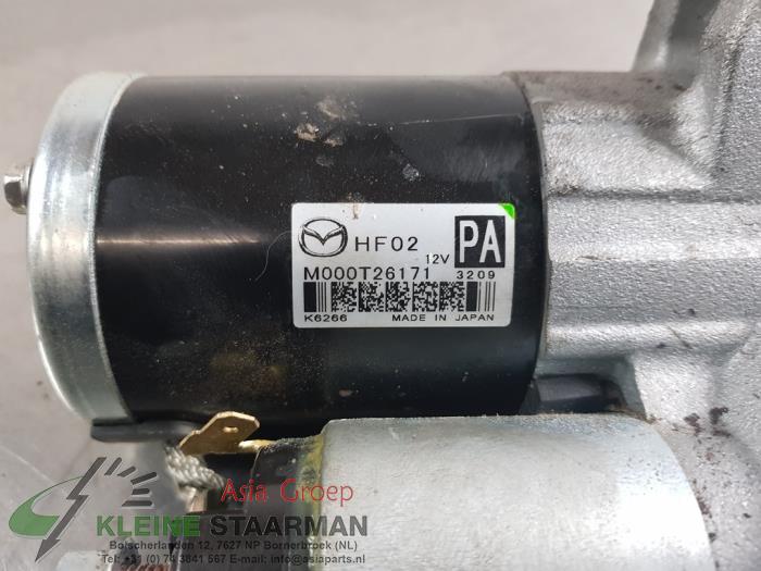 Startmotor från en Mazda CX-30 (DM) 2.0 e-SkyActiv X 186 M Hybrid 16V 2023