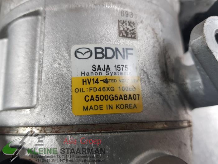 Luftkonditioneringspump från en Mazda CX-30 (DM) 2.0 e-SkyActiv X 186 M Hybrid 16V 2023