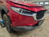 Främre stötfångare från en Mazda CX-30 (DM) 2.0 e-SkyActiv X 186 M Hybrid 16V 2023