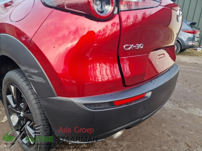 Bakre stötfångare från en Mazda CX-30 (DM) 2.0 e-SkyActiv X 186 M Hybrid 16V 2023