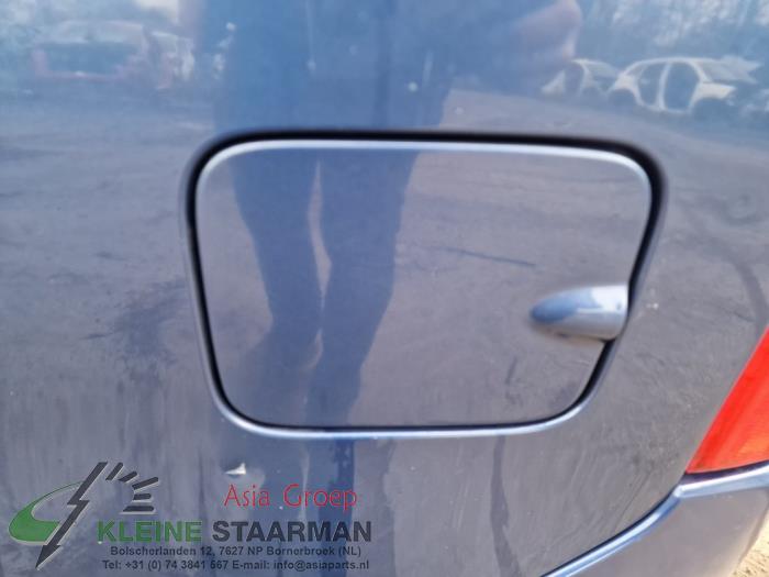 Tanklucka från en Suzuki Wagon-R+ (RB) 1.3 16V VVT 2006