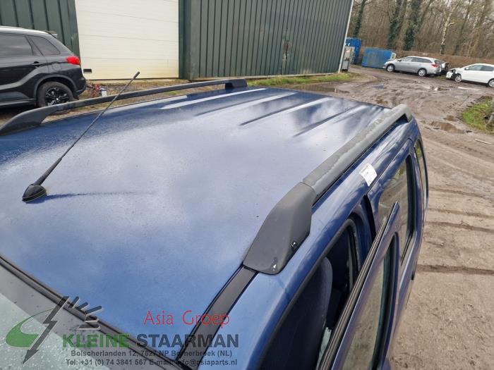 Takräcke, vänster från en Suzuki Wagon-R+ (RB) 1.3 16V VVT 2006