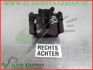 Używane Zacisk hamulcowy prawy tyl Toyota Corolla (E12) 1.4 16V VVT-i Cena € 42,50 Procedura marży oferowane przez Kleine Staarman B.V. Autodemontage