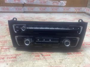 Begagnade Värmekontrollpanel BMW 1 serie (F20) 116i 1.6 16V Pris € 21,78 Inklusive moms erbjuds av Autosloperij de Turk