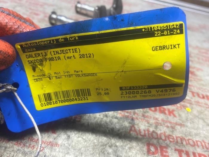 Bränsleinsprutningsmunstycke från en Skoda Fabia II (5J) 1.2 TSI 2012