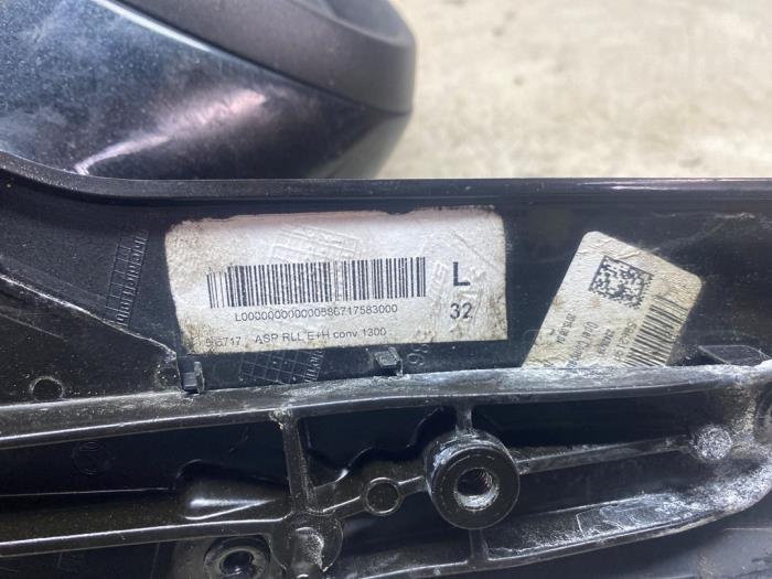 Buitenspiegel links van een Opel Astra J GTC (PD2/PF2) 1.4 Turbo 16V ecoFLEX 120 2016