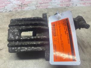 Używane Zacisk hamulcowy prawy tyl Volkswagen Golf V (1K1) 1.6 FSI 16V Cena € 10,89 Z VAT oferowane przez Autosloperij de Turk