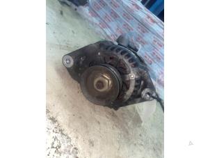 Używane Pradnica Daihatsu Cuore (L251/271/276) 1.0 12V DVVT Cena € 54,45 Z VAT oferowane przez Autosloperij de Turk