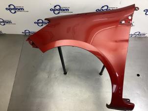 Gebruikte Spatbord links-voor Renault Clio III (BR/CR) 1.2 16V 75 Prijs € 49,00 Margeregeling aangeboden door Gebr Opdam B.V.