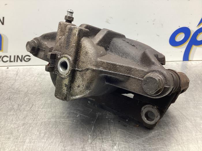 Främre bromsok, vänster från en Opel Agila (A) 1.2 16V Twin Port 2006