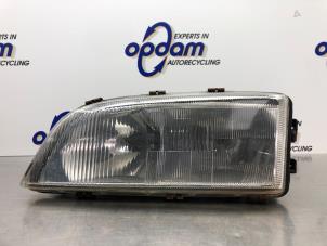 Gebruikte Koplamp links Volvo C70 (NK) 2.3 T5 20V Prijs € 40,00 Margeregeling aangeboden door Gebr Opdam B.V.