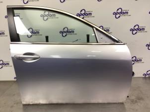 Begagnade Framdörr, 4-dörrars, höger Mazda 6 SportBreak (GH19/GHA9) 2.0i 16V S-VT Pris € 150,00 Marginaltabell erbjuds av Gebr Opdam B.V.