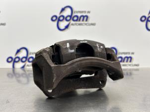 Gebruikte Remklauw (Tang) links-voor Ford Fiesta 6 (JA8) 1.0 SCI 12V 80 Prijs € 50,00 Margeregeling aangeboden door Gebr Opdam B.V.