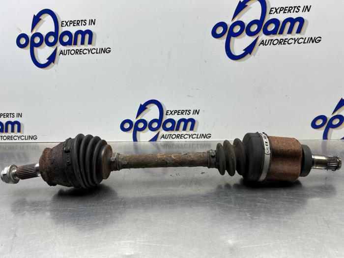 Drivaxel, vänster fram från en MINI Mini Open (R57) 1.6 16V Cooper S 2010