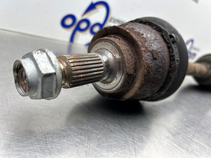 Drivaxel, vänster fram från en MINI Mini Open (R57) 1.6 16V Cooper S 2010