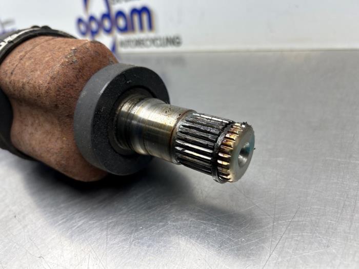 Drivaxel, vänster fram från en MINI Mini Open (R57) 1.6 16V Cooper S 2010