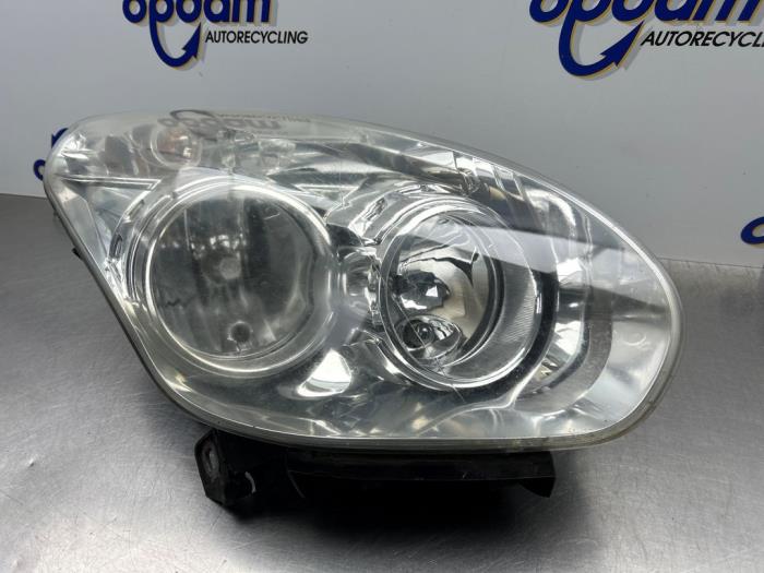 Strålkastare, höger från en Fiat Doblo Cargo (263) 1.3 MJ 16V Euro 4 2011