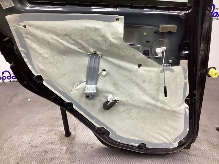 Fönstermekanism för bakre dörr, 4-dörrars, vänster från en Chevrolet Spark (M300) 1.0 16V Bifuel 2011