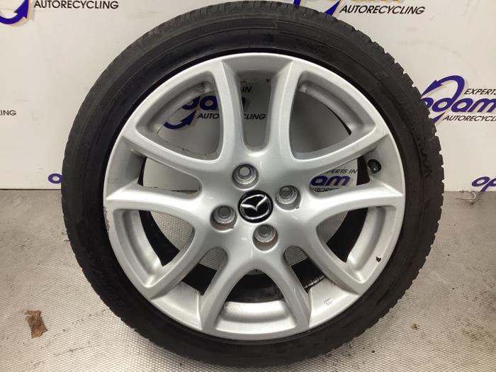 Zestaw felg sportowych + opony zimowe z Mazda 2 (DE) 1.3 16V MZR 2014