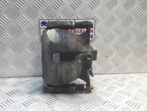 Używane Zacisk hamulcowy lewy przód Audi A3 Sportback (8VA/8VF) 2.0 TFSI Ultra 16V Cena € 25,00 Procedura marży oferowane przez Automaterialen Ronald Morien B.V.