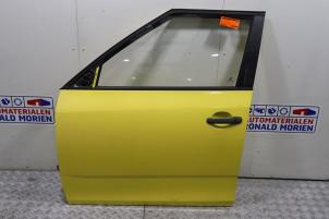 Gebruikte Portier 4Deurs links-voor Skoda Fabia II (5J) 1.2i Prijs € 95,00 Margeregeling aangeboden door Automaterialen Ronald Morien B.V.