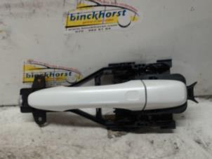 Gebruikte Portiergreep 4Deurs links-achter Volvo V60 I (FW/GW) 2.4 D6 20V Plug-in Hybrid AWD Prijs € 21,00 Margeregeling aangeboden door Binckhorst BV