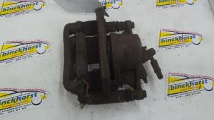 Begagnade Främre bromsok, höger Toyota Carina E (T19) 1.6 GLi 16V Pris € 36,75 Marginaltabell erbjuds av Binckhorst BV