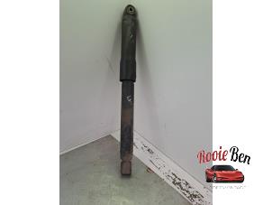 Gebruikte Schokdemper links-achter Jeep Grand Cherokee (WH/WK) 5.7 V8 Hemi Prijs op aanvraag aangeboden door Rooie Ben autodemontage