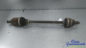 Używane Os napedowa lewy tyl Ford Focus Cena € 157,00 Procedura marży oferowane przez Klein Gunnewiek Autodemontage & Motorentechniek