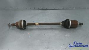 Używane Os napedowa lewy tyl Ford Focus Cena € 157,00 Procedura marży oferowane przez Klein Gunnewiek Autodemontage & Motorentechniek