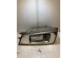 Gebruikte Koplamp links Kia Pregio (TB) 2.7 D Prijs op aanvraag aangeboden door Verhoef Cars & Parts