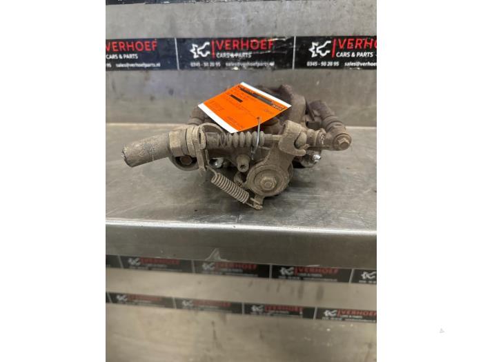 Remklauw (Tang) links-achter van een Opel Zafira Tourer (P12) 1.6 CDTI 16V ecoFLEX 136 2013