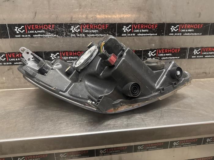 Strålkastare, vänster från en Suzuki Splash 1.2 16V 2008