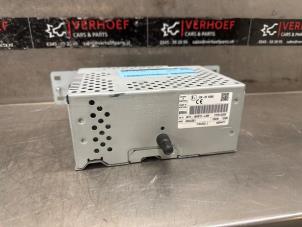 Używane Radio Ford Focus 4 Wagon 1.5 EcoBoost 12V 150 Cena € 200,00 Procedura marży oferowane przez Verhoef Cars & Parts