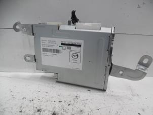 Begagnade Radiomodul Mazda 3 (BM/BN) 2.2 SkyActiv-D 150 16V Pris € 150,00 Marginaltabell erbjuds av Verhoef Cars & Parts