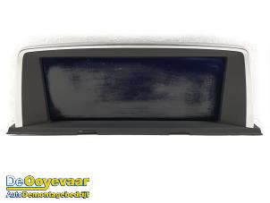 Gebruikte Navigatie Display BMW 6 serie Gran Coupe (F06) M6 V8 32V TwinPower Turbo Prijs € 299,99 Margeregeling aangeboden door Autodemontagebedrijf De Ooyevaar