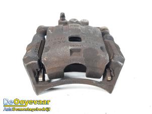 Gebruikte Remklauw (Tang) rechts-voor Ford Fiesta 6 (JA8) 1.0 SCI 12V 80 Prijs € 9,99 Margeregeling aangeboden door Autodemontagebedrijf De Ooyevaar