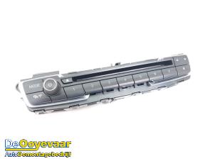 Begagnade Radiokontrollpanel BMW 2 serie Active Tourer (F45) 216i 1.5 TwinPower Turbo 12V Pris € 25,00 Marginaltabell erbjuds av Autodemontagebedrijf De Ooyevaar