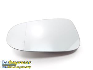 Gebruikte Spiegelglas links Volkswagen Golf VI (5K1) 1.4 TSI 122 16V Prijs € 19,99 Margeregeling aangeboden door Autodemontagebedrijf De Ooyevaar