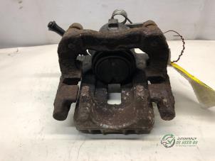 Gebruikte Remklauw (Tang) rechts-achter Skoda Octavia Combi (1U5) Prijs € 35,00 Margeregeling aangeboden door Autobedrijf de Heer B.V.