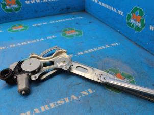 Begagnade Fönstermekanism för bakre dörr, 4-dörrars, vänster Toyota Prius (ZVW3) 1.8 16V Pris € 73,50 Marginaltabell erbjuds av Maresia Auto Recycling B.V.