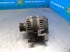 Dynamo från en Opel Adam 1.2 16V 2014