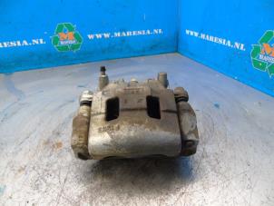 Gebruikte Remklauw (Tang) rechts-voor Mitsubishi Eclipse Cross (GK/GL) 2.4 16V PHEV 4x4 Prijs € 131,25 Margeregeling aangeboden door Maresia Auto Recycling B.V.