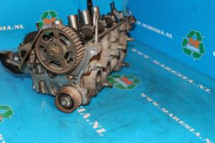 Begagnade Topplock Toyota Corolla (E10) 1.6i 16V Pris € 157,50 Marginaltabell erbjuds av Maresia Auto Recycling B.V.