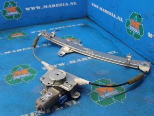 Begagnade Fönstermekanism för bakre dörr, 4-dörrars, vänster Chevrolet Aveo (250) 1.2 16V Pris € 57,75 Marginaltabell erbjuds av Maresia Auto Recycling B.V.