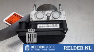 Używane Sterownik ABS Nissan Note (E11) 1.4 16V Cena € 60,00 Procedura marży oferowane przez Relder Parts B.V.