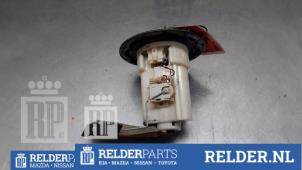 Używane Elektryczna pompa paliwa Mazda Premacy 1.8 16V Cena € 32,00 Procedura marży oferowane przez Relder Parts B.V.